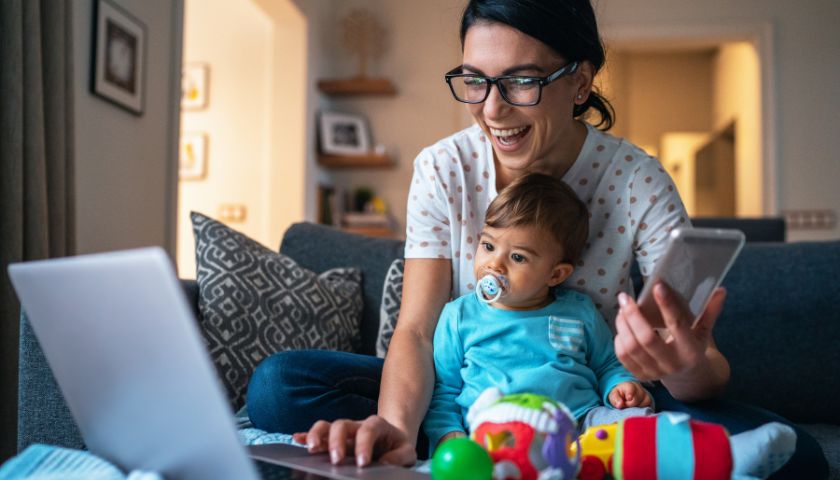 young woman looking at laptop